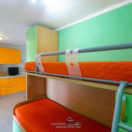 Apartments Casa Vacanze Porto Pino Esterno foto