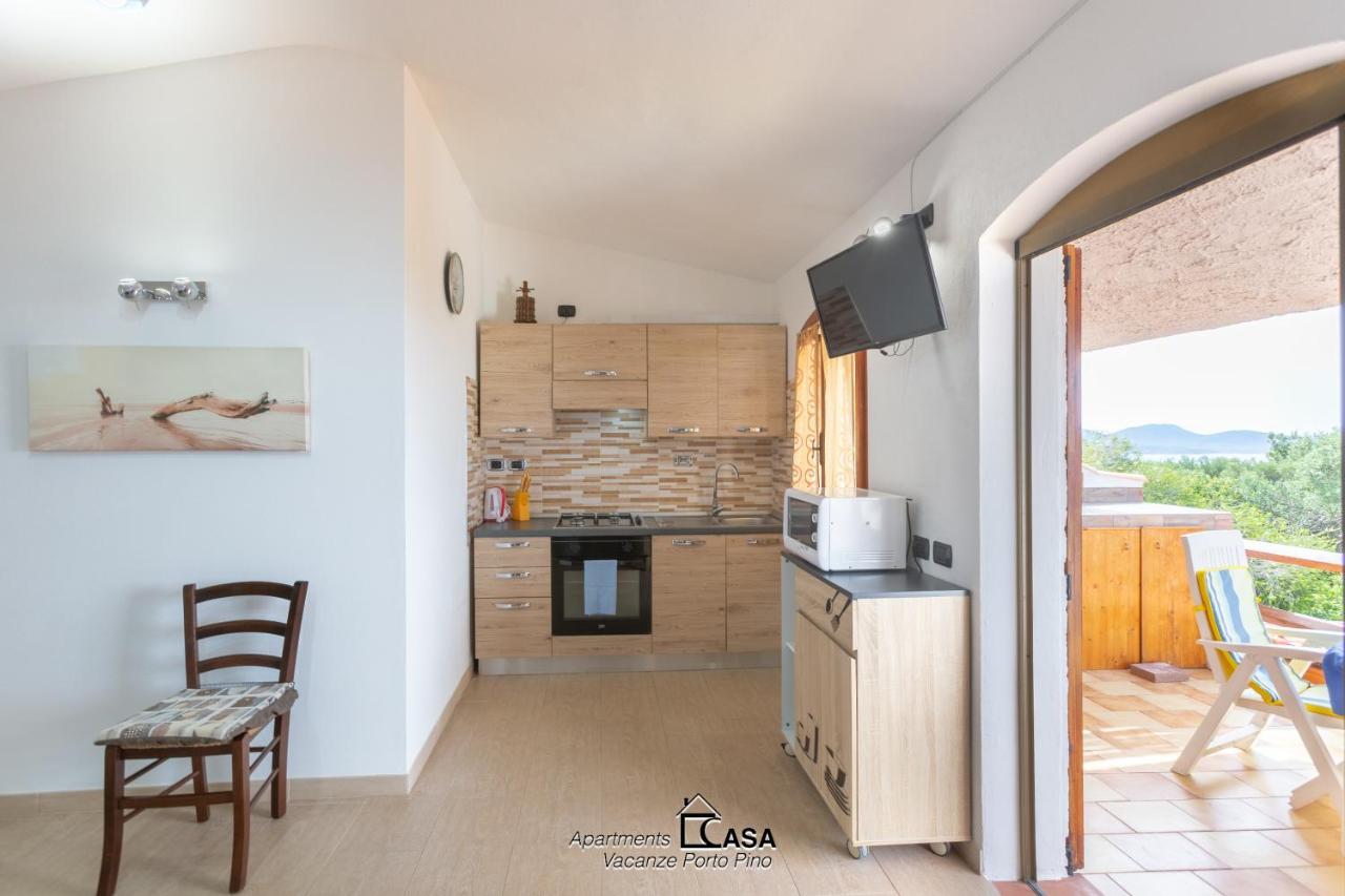 Apartments Casa Vacanze Porto Pino Esterno foto