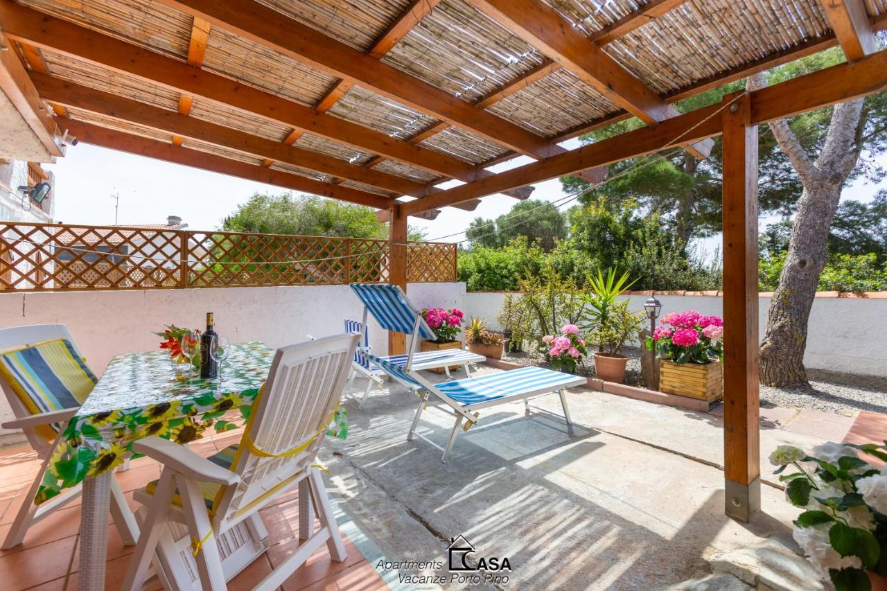 Apartments Casa Vacanze Porto Pino Esterno foto