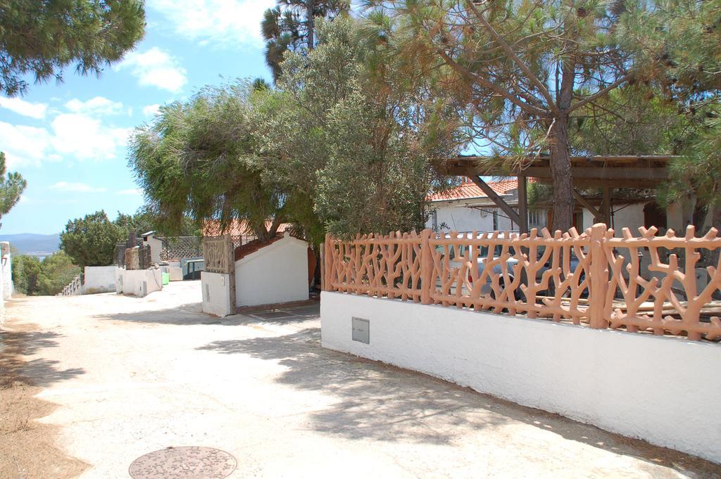 Apartments Casa Vacanze Porto Pino Esterno foto