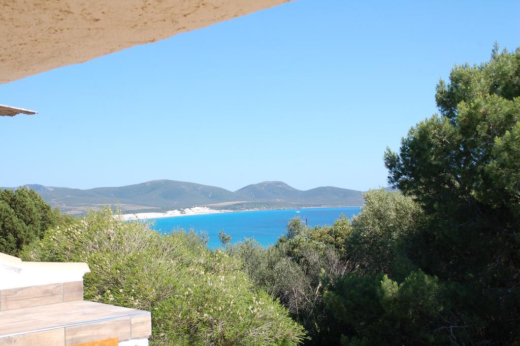 Apartments Casa Vacanze Porto Pino Esterno foto