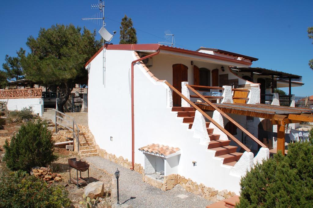 Apartments Casa Vacanze Porto Pino Esterno foto